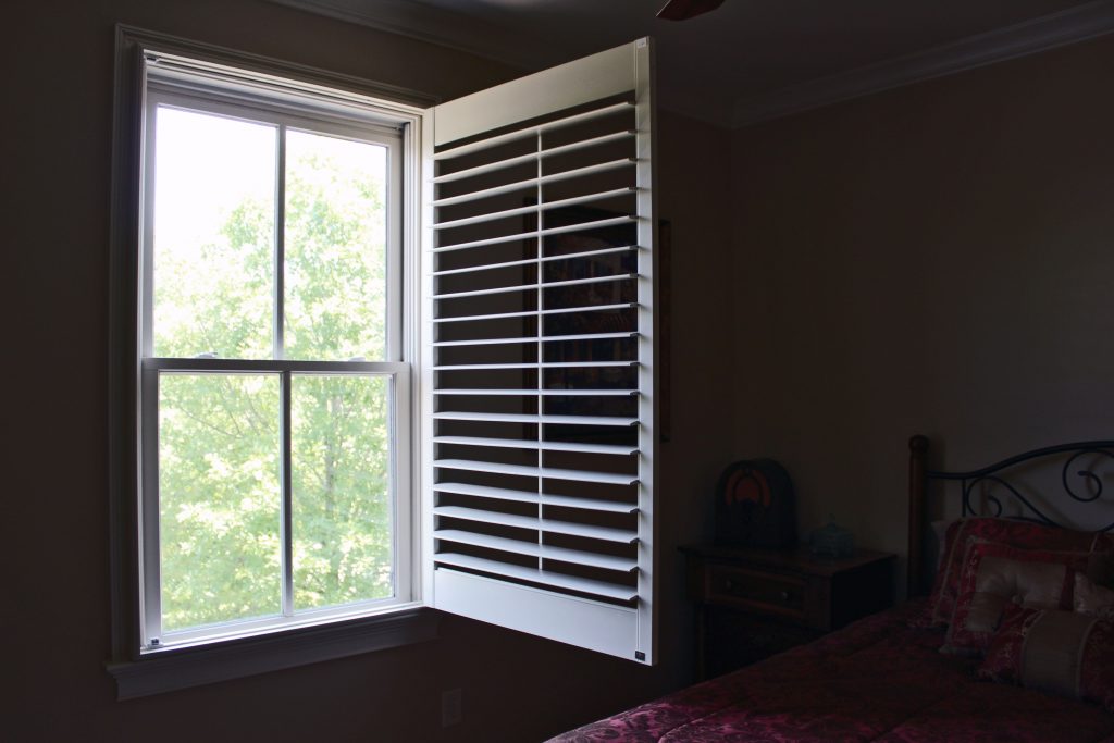 custom painted opening plantation shutters